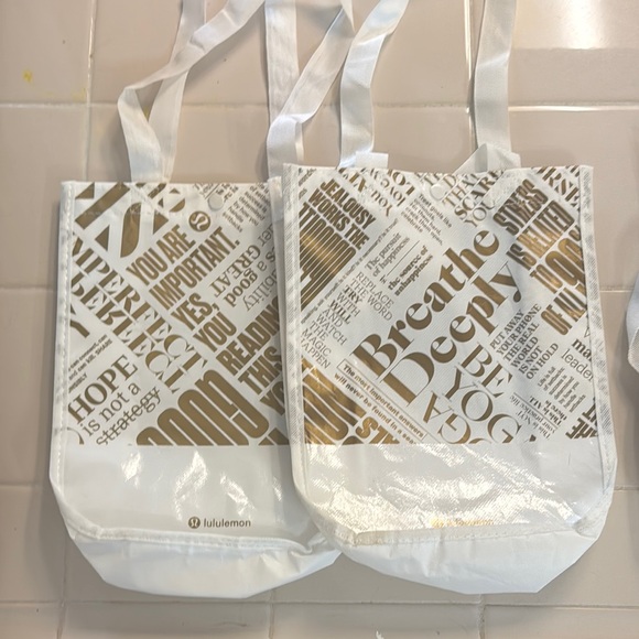 lululemon athletica Handbags - Lululemon White and Gold Tote Bags